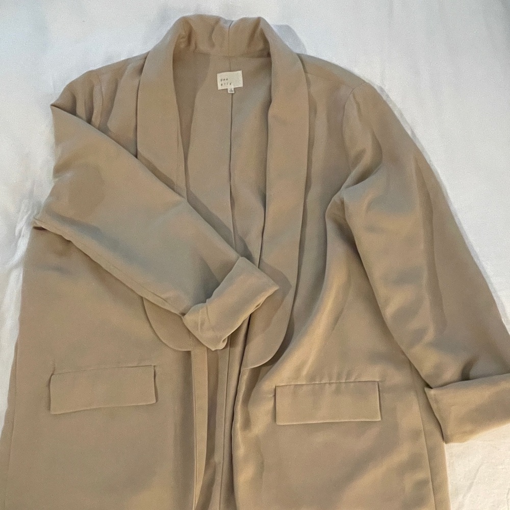 Women’s taupe blazer. Slightly oversized, but good quality.  Not too heavy